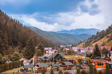 Moeciu de Sus, Romania,  30th of July 2022 - Landscape of mountains and cottage complex