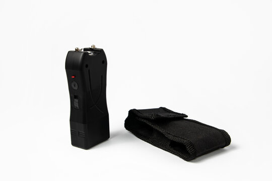 Black electric shocker and flashlight  with a bag on a white background