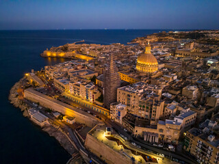 Aerial view of Valletta city- capital of Malta. Evening, sunset sky, Grand harbour
