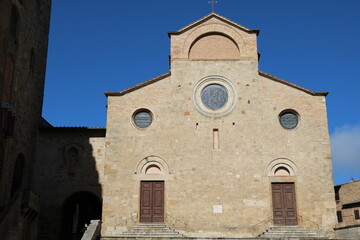 Fototapeta na wymiar Duomo di San Gimignano in San Gimignano, Tuscany Italy