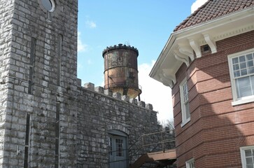 Old water tower behind castle in Kentucky