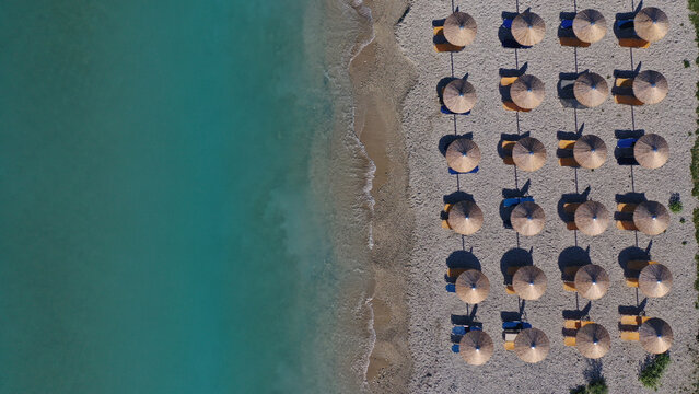 Aerial drone photo of beautiful seaside village and bay of Vasiliki famous for surfing activities, Lefkada island, Ionian, Greece