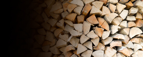 Background with old wooden boards, harvested firewood.