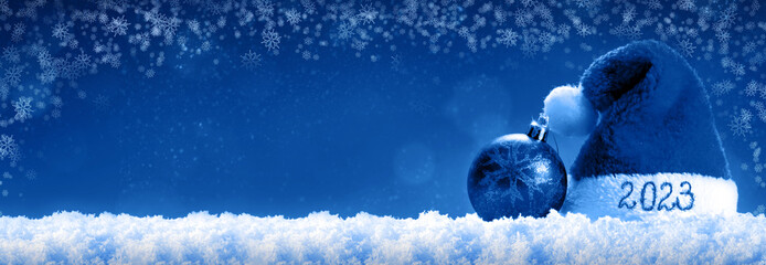 Christmas background with blue Santa hat ,new year 2023
