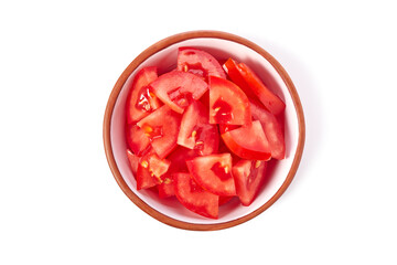 Bowl with chopped juicy tomatoes on white background