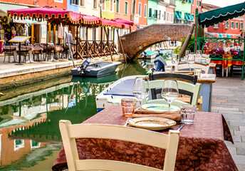 Fototapeta na wymiar typical italian sidewalk cafe - restaurant