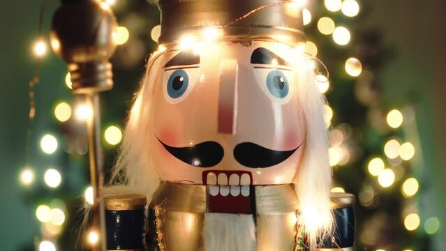 Nutcracker puppet Christmas against the Christmas tree