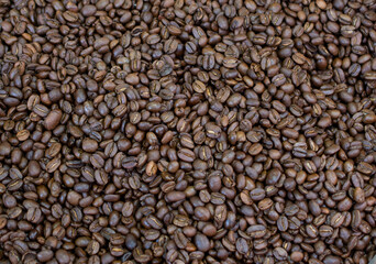 Coffee beans ready for the grinder background