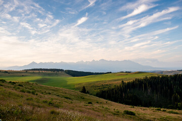 High Tatras from Panska Hola, Low Tatras National Park Slovakia.Green meadows and mountains in the background. © Filip