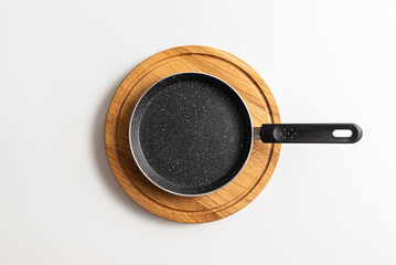 Empty pan on wood board. pan for pancake