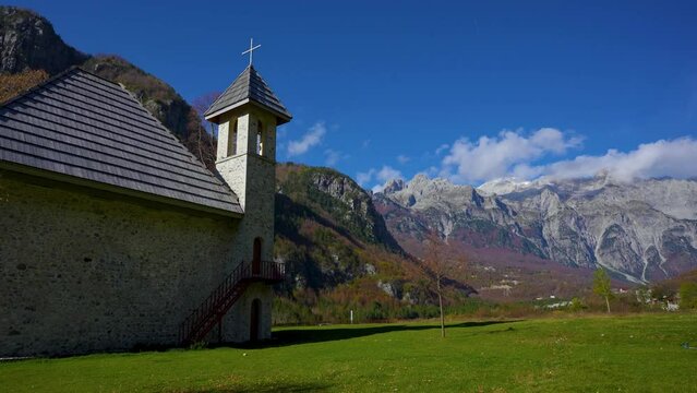 4K footage of theth national park albania with stone church and mountains for trekking and touristic destination for vacation