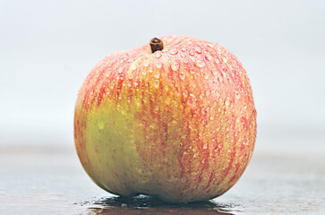 apple with water drops, ripe apple with drops, after rain, close-up, fruit