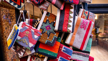 Small wallet bags prepared with traditional weaving methods, Turkish hand-woven art products sold...