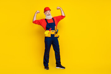 Full size photo of successful retired workman show biceps master fix reconstruction isolated on bright color background