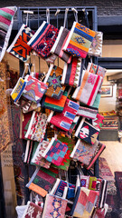 Small wallet bags prepared with traditional weaving methods, Turkish hand-woven art products sold in touristic districts of Istanbul