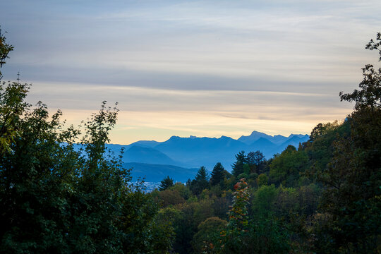 Meylan France 11 11 2022 hiking in the forest, pretty early sunset over the mountains, autumn landscapes © JulieMeneghin