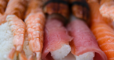 A close-up photography of a set of sushi rolls. Home delivery, Japanese cuisine