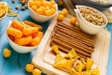 Salty snacks served as party food in bowls
