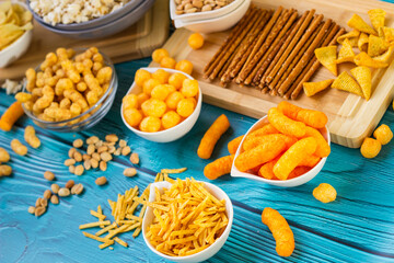 Salty snacks served as party food in bowls