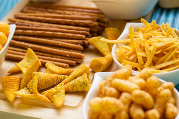 Salty snacks on the table ready to party