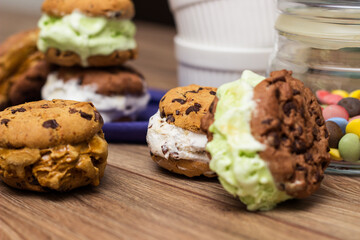 Chocolate chip ice cream cookie sandwiches with vanilla, chocolate and pistachios