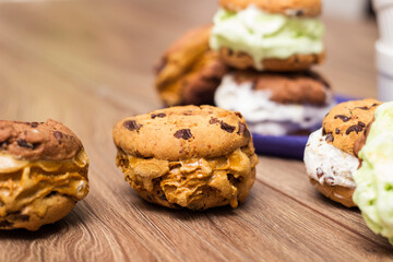 Chocolate chip ice cream cookie sandwiches with vanilla, chocolate and pistachios