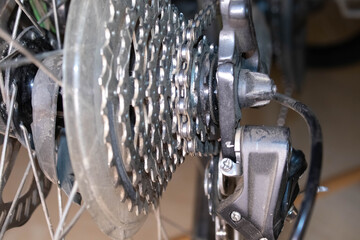 Rear wheel cassette and chain in a mountain bike. Close up detailed view.