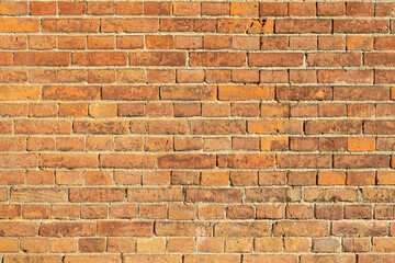 Close-up of an orange brick wall, concept