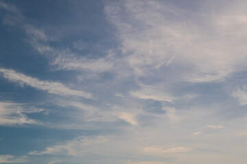 blue sky background with white striped clouds in heaven and infinity may use for sky replacement.