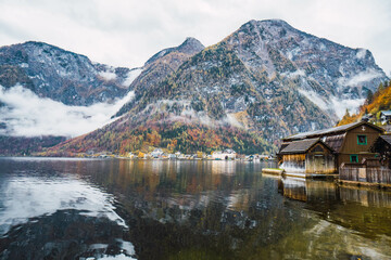 Fototapeta premium hallstatt village houses by the lake against mountains