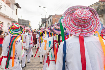 Members of the cultural event Encontro de Chegancas, in Saubara Bahia, parade through the city...