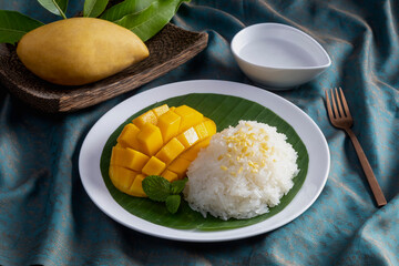 mango with sticky rice is popular traditional dessert of thailand.