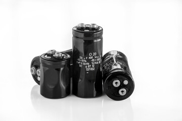 High voltage electrolytic capacitors on white background
