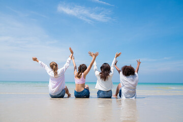Happy teenagers at beach party together on the beach having fun in a sunny day, Beach summer holiday sea people concept