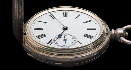 Antique pocket watch closeup in oblique perspective