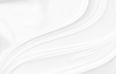 White gray satin texture that is white silver fabric silk background with beautiful soft blur pattern natural.