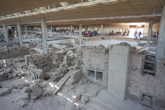 Akrotiri, Santorini, Greece: Tourists at the Archaeological Site of the Minoan Bronze Age Settlement