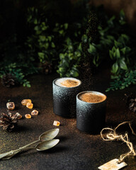 Christmas or New Year winter hot chocolate with marshmallows in mug over wooden board selective focus, copy space