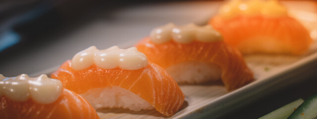 Salmon sushi is a popular fish dish. sushi is a street food of japan and new business in the world.