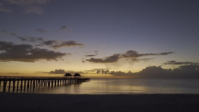 Beautiful Sunset of Florida Pier shot on a Drone with Orange Sky
