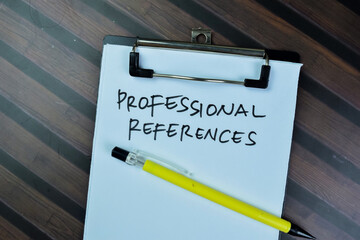 Concept of Professional References write on paperwork isolated on Wooden Table.