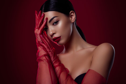 Portrait of magnificent lady wearing red hand accessories black bra look attractive isolated on maroon color background