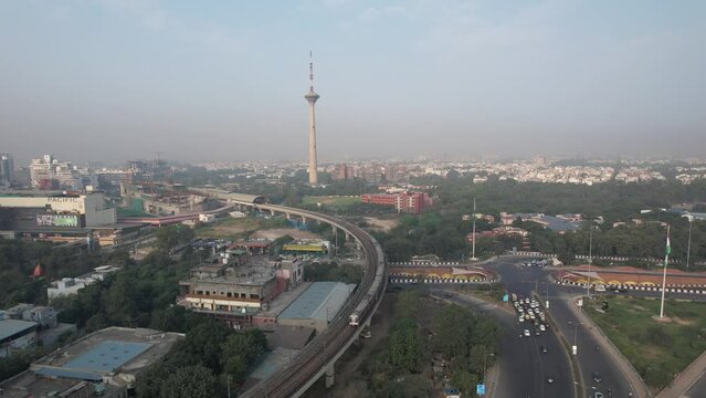 Drone footage of Delhi metro train and pitampura tower at netaji subhash place metro station 