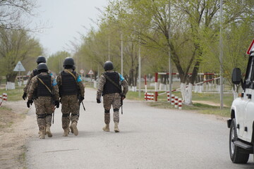 Naklejka premium Almaty, Kazakhstan - 04.14.2022 : The combat team is going to the place of deployment. Military exercises.
