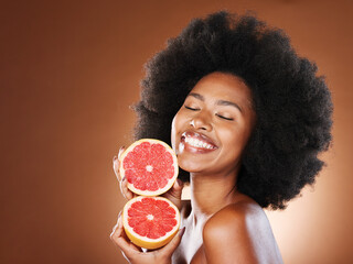 Black woman, afro hair or grapefruit for face skincare, healthcare wellness glow or vitamin c...