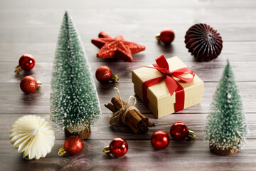 Fototapeta na wymiar Christmas trees and red ornament decorations.