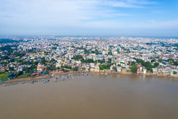 Aerial view of Varanasi city with  Ganges river, ghats, the houses in Varanasi, Banaras, Uttar Pradesh, India