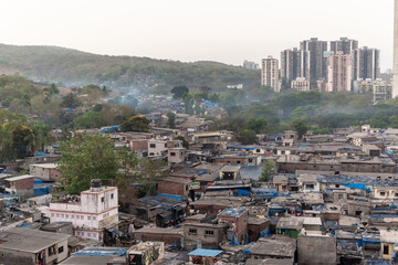 A skyline cityscape of Kandivali with high rise skyscrapers rising above slums.