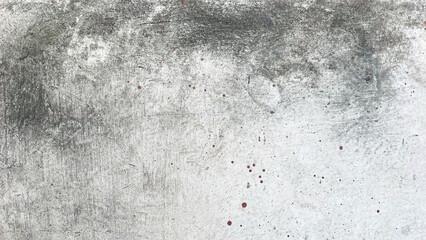 Stains on the grey wall texture background, from water and house paint.