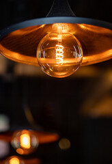 Decorative vintage lamp on the ceiling in a restaurant.